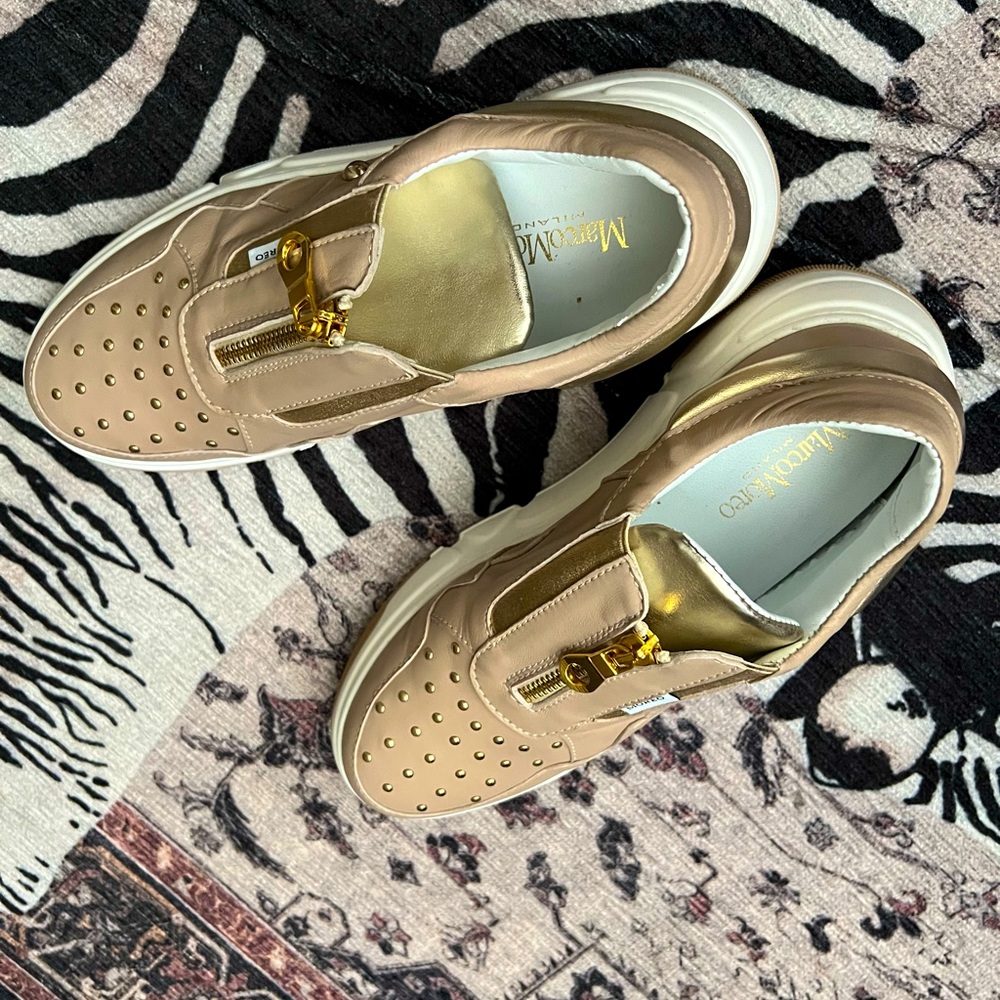 Handmade, soft Italian leather sneakers with gold zipper.
